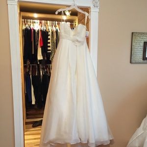 a Galina off white wedding dress new never worn!!